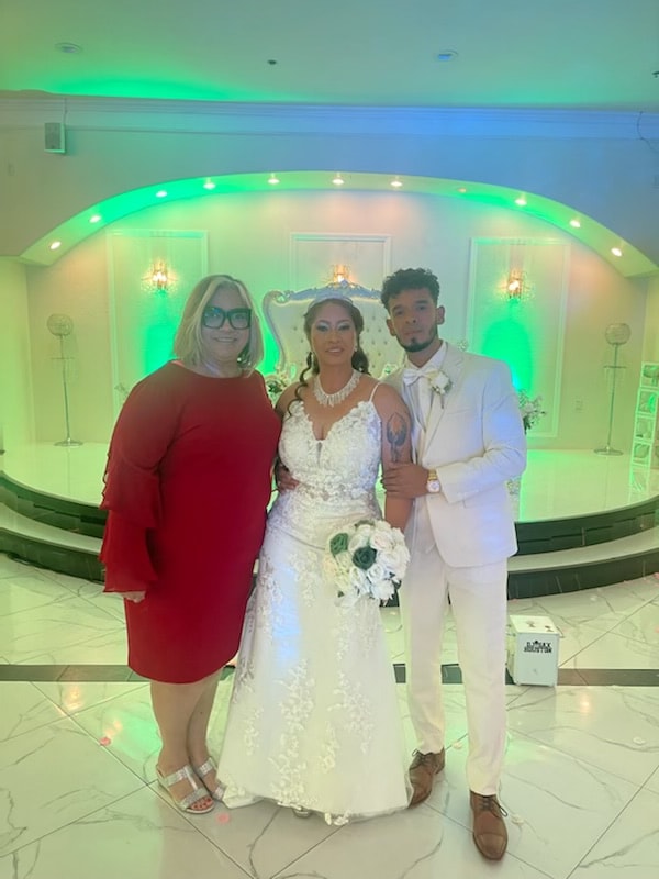 Wedding venue celebration in Houston with neon lighting officiated by Apostille Ease