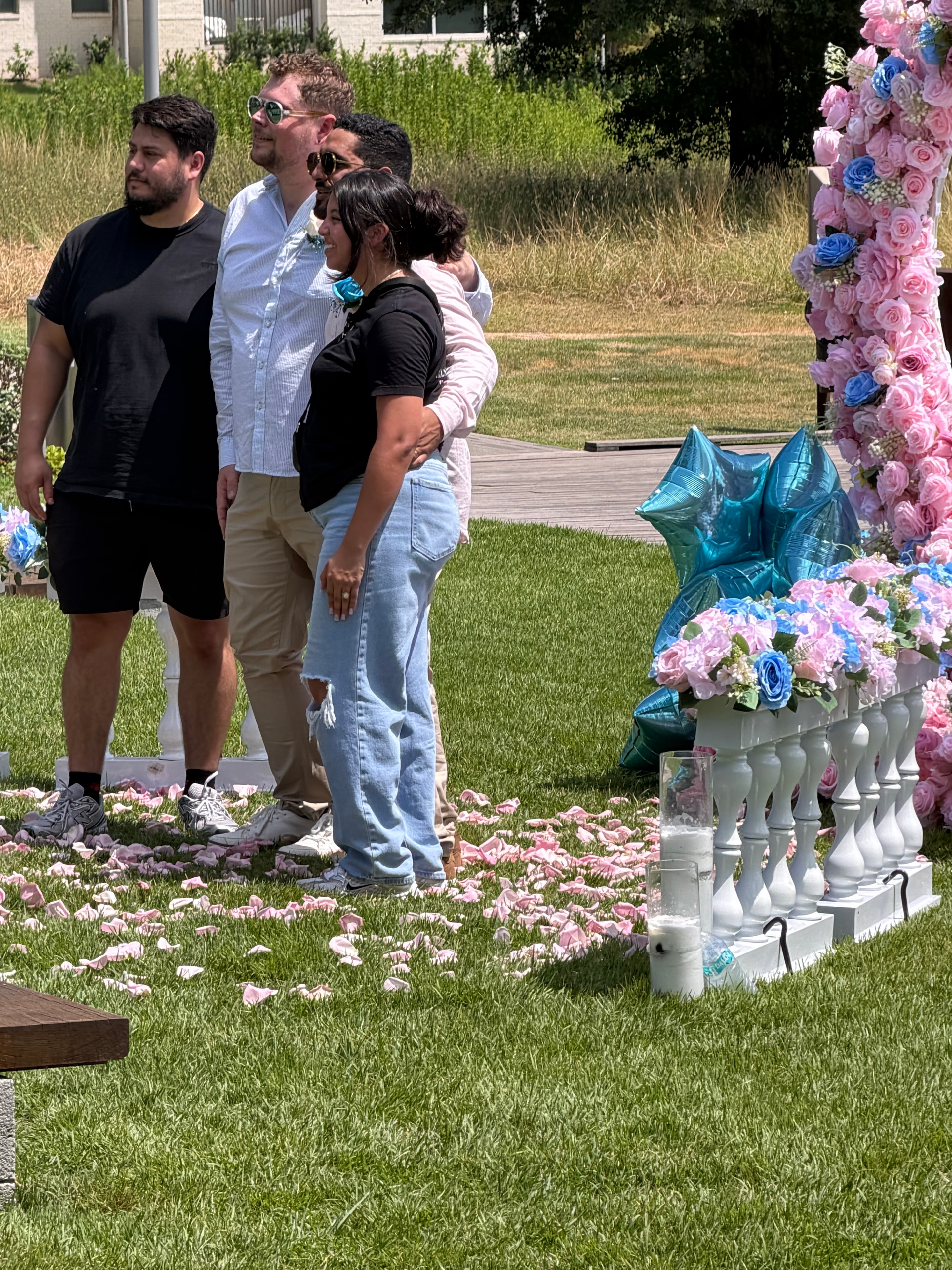 Floral arch wedding ceremony in Houston officiated by Apostille Ease bilingual officiant